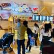 May be an image of one or more people, people standing and indoor